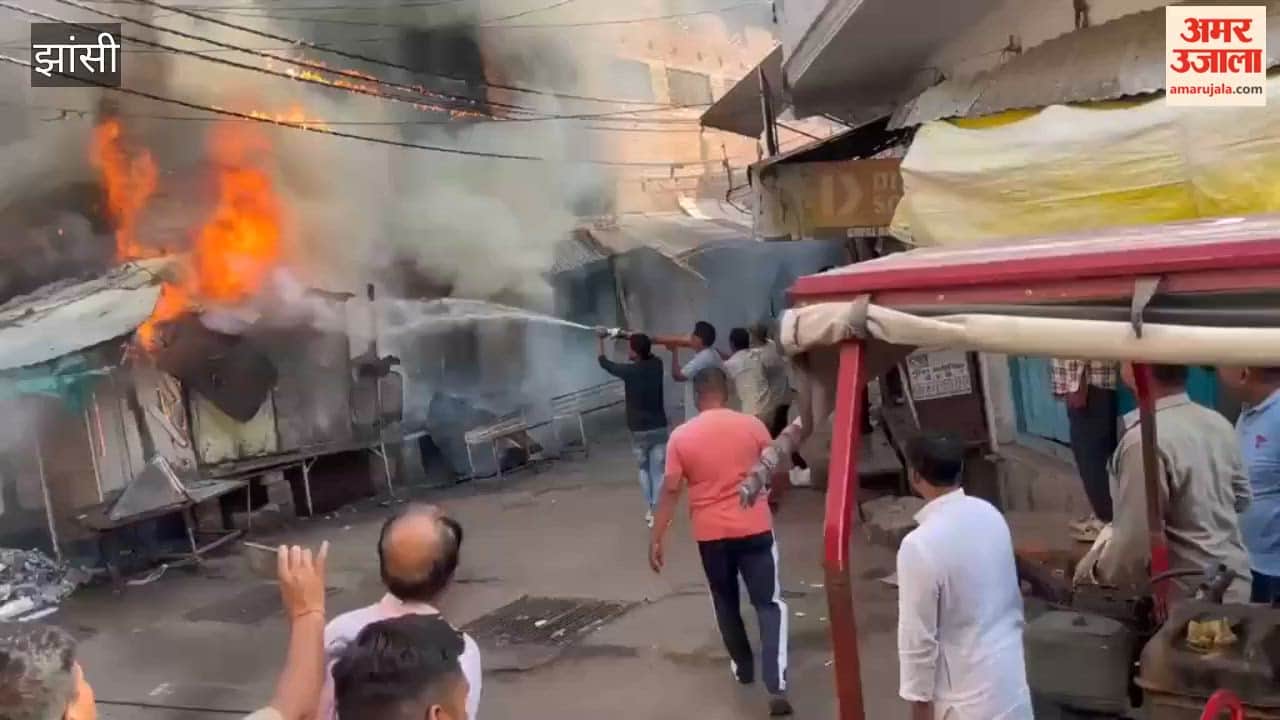 A massive fire in Mauranipur gutted three shops, leaving the fire brigade scrambling to extinguish the fire.