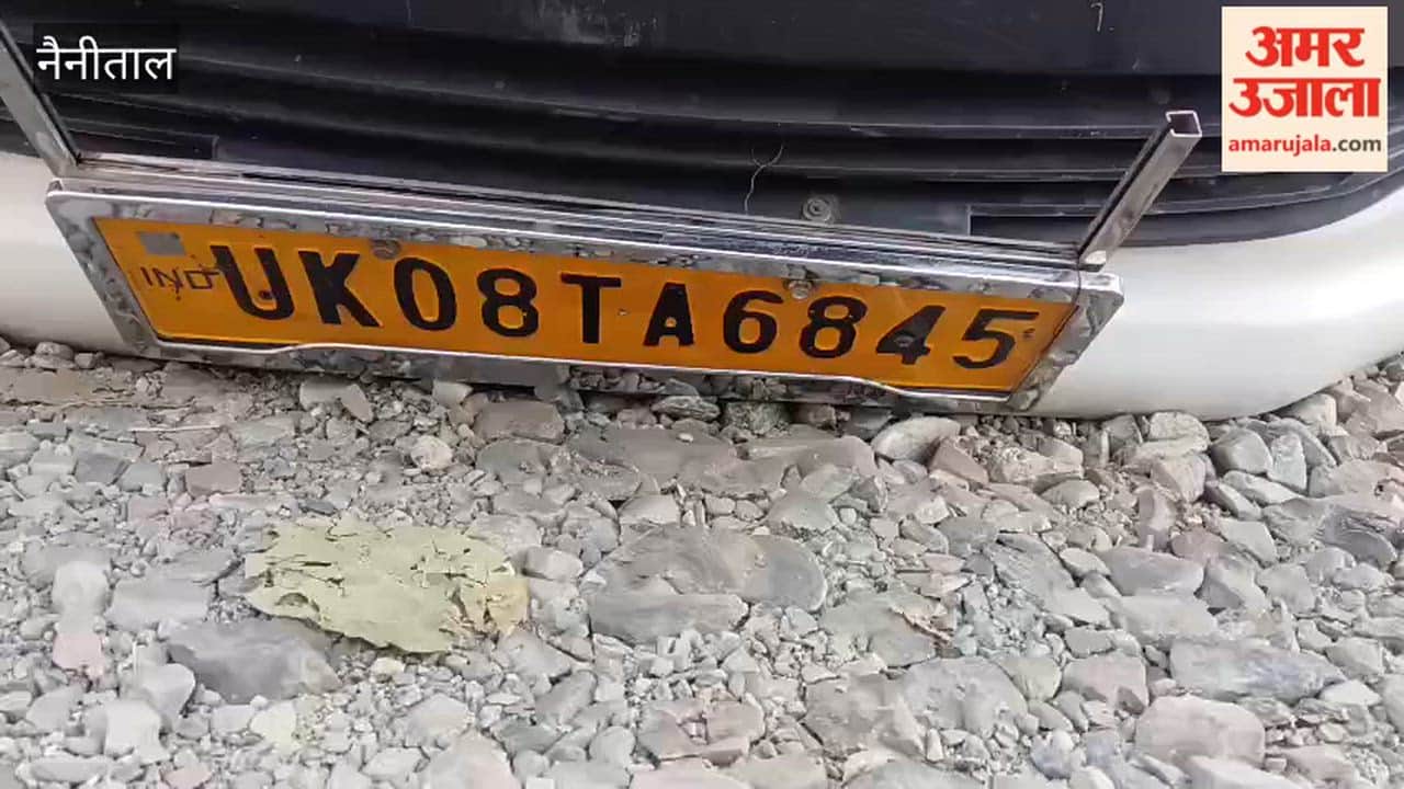 Innova car hanging from a height on Unchapul in Haldwani