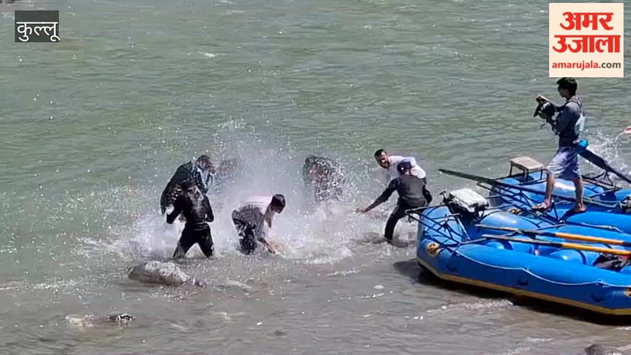 Kullu: Tourists enjoying rafting in the Beas River.