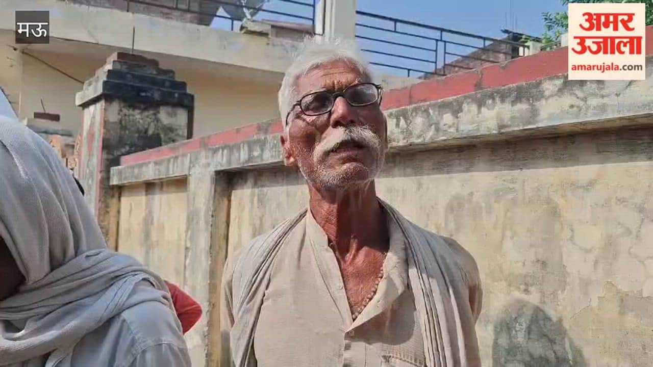 Drainage water flows between two houses road shambles angry villagers raise slogans