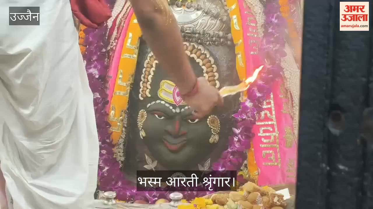 devotees looking Baba Mahakal, adorned cannabis Tripund Trinetra