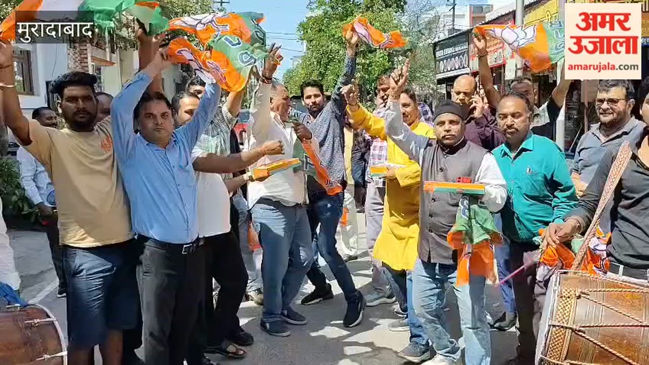 Celebrations in Moradabad over BJP's victory; party workers distribute sweets.