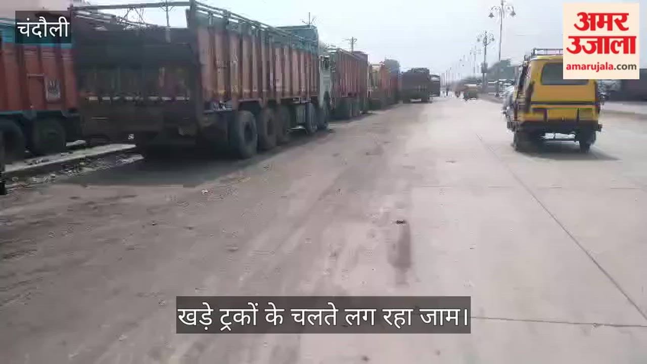 Coal Market Trucks Lined Up in Three Lanes on Six-Lane Highway