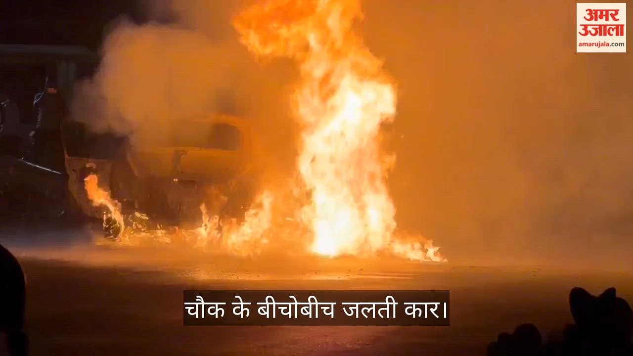 A moving car caught fire, the driver jumped out to save his life.