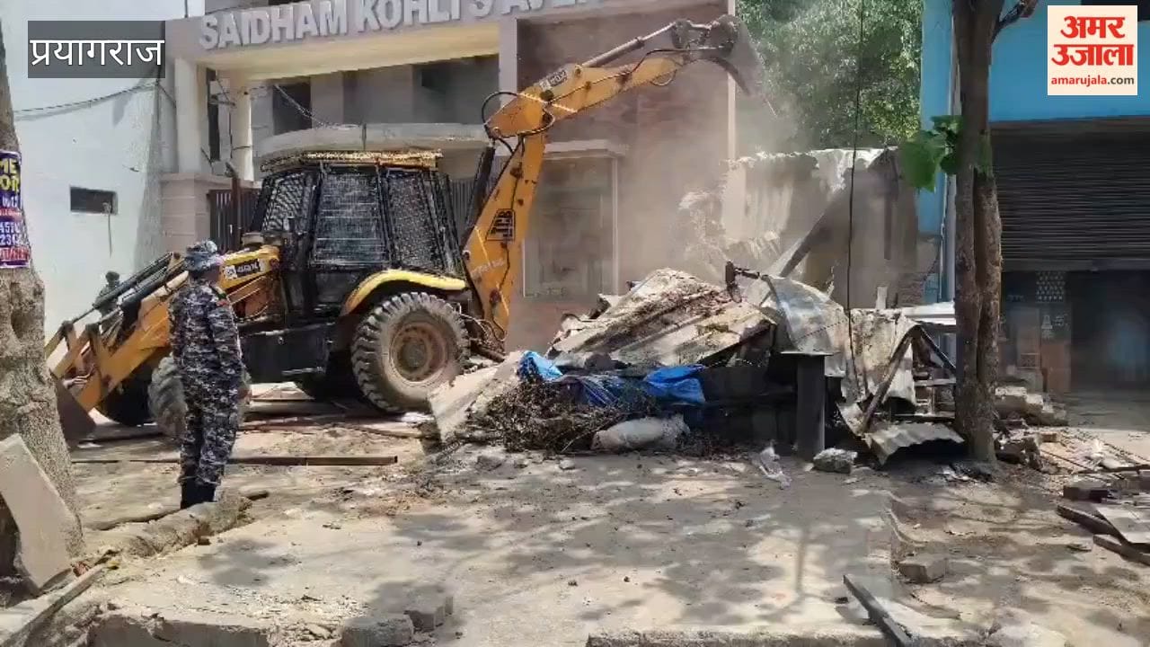 Bulldozer runs on illegal welding shop running on Municipal Corporation land