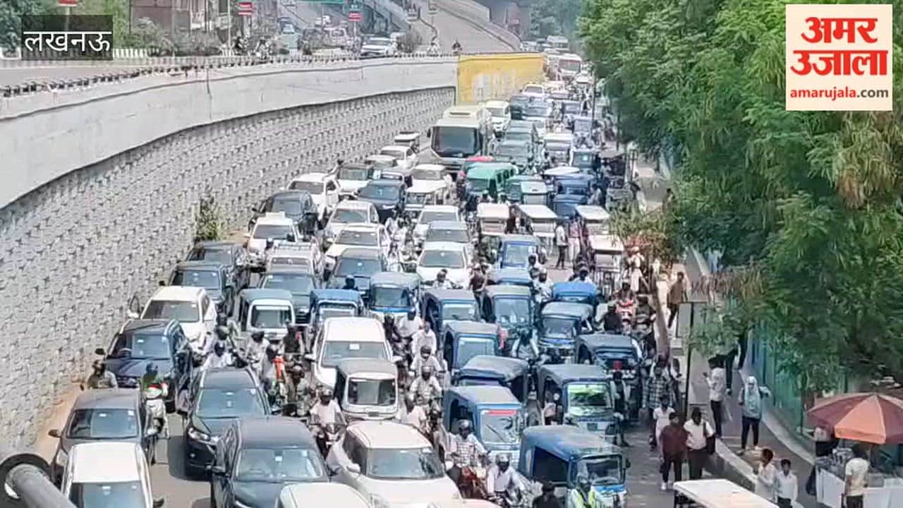 लखनऊ में मुंशी पुलिया से पॉलिटेक्निक की तरफ आने वाली रोड पर लगा लंबा जाम
