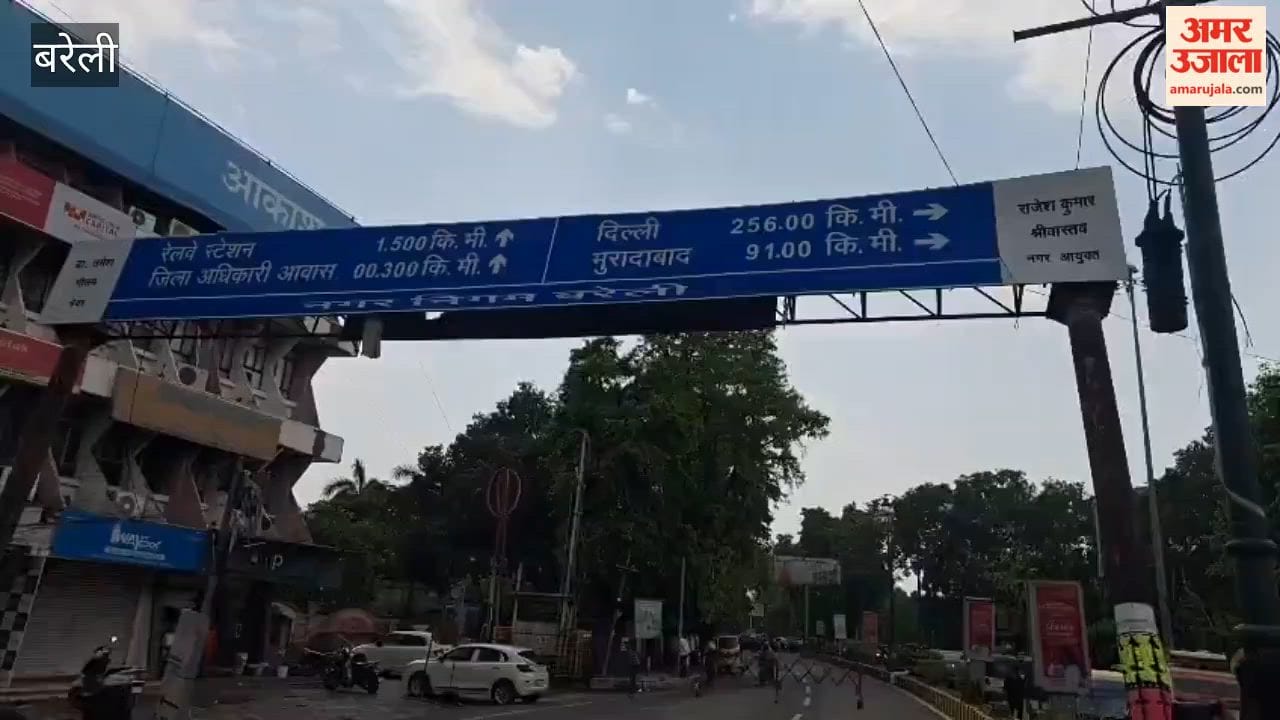 Signboard on Collectorate Road in Bareilly tilted due to storm