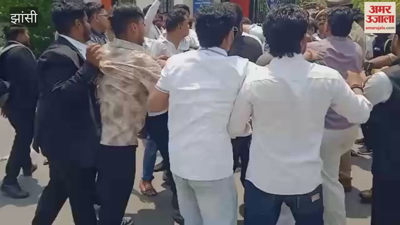 Law students at BU University stage a protest, enraged by the removal of a security guard at the gate.
