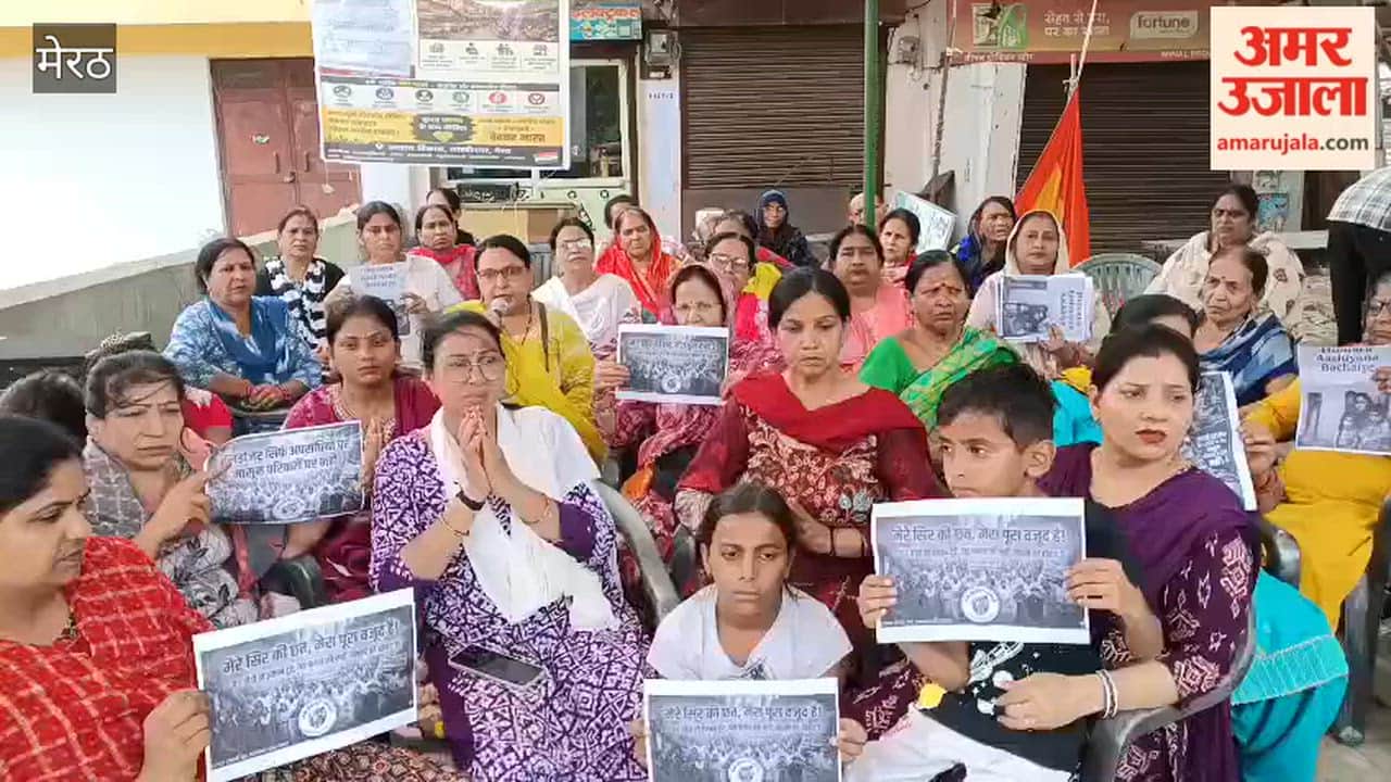 Women's sit-in protest continues in Sector 3, accompanied by slogans such as, "Run bulldozers against criminals, not innocent families."