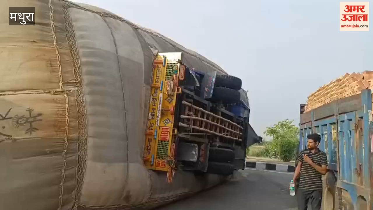 Hay-Laden Trailer Overturns on NH-19 Massive Traffic Jam Continues for Hours