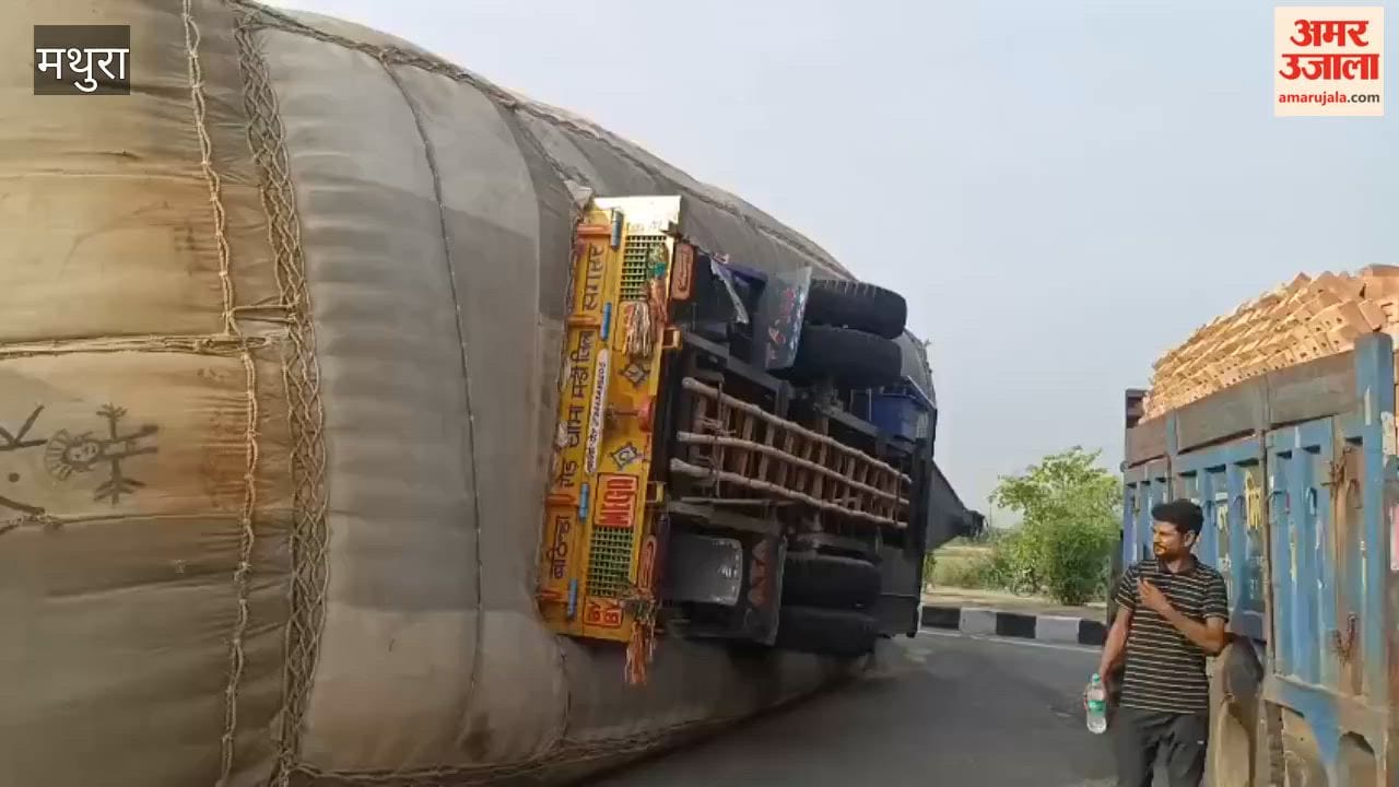 Hay-Laden Trailer Overturns on NH-19 Massive Traffic Jam Continues for Hours