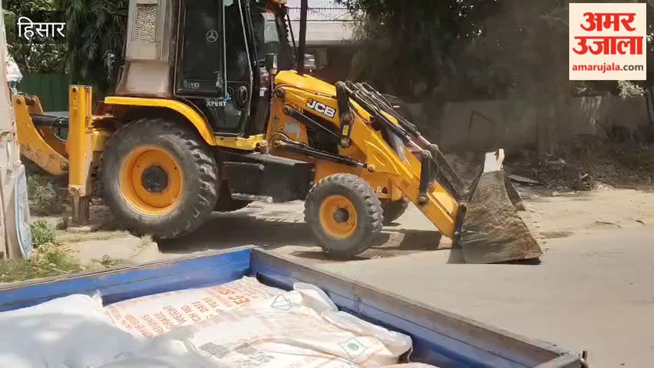 Encroachments outside houses in Urban Estate-II, Hisar, were demolished using a JCB
