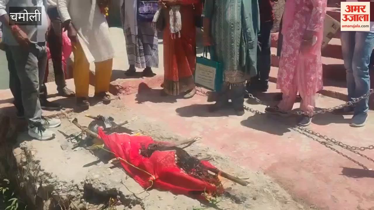 Karnaprayag Disaster-affected families procession with  symbolic bier and perform funeral rites at confluence