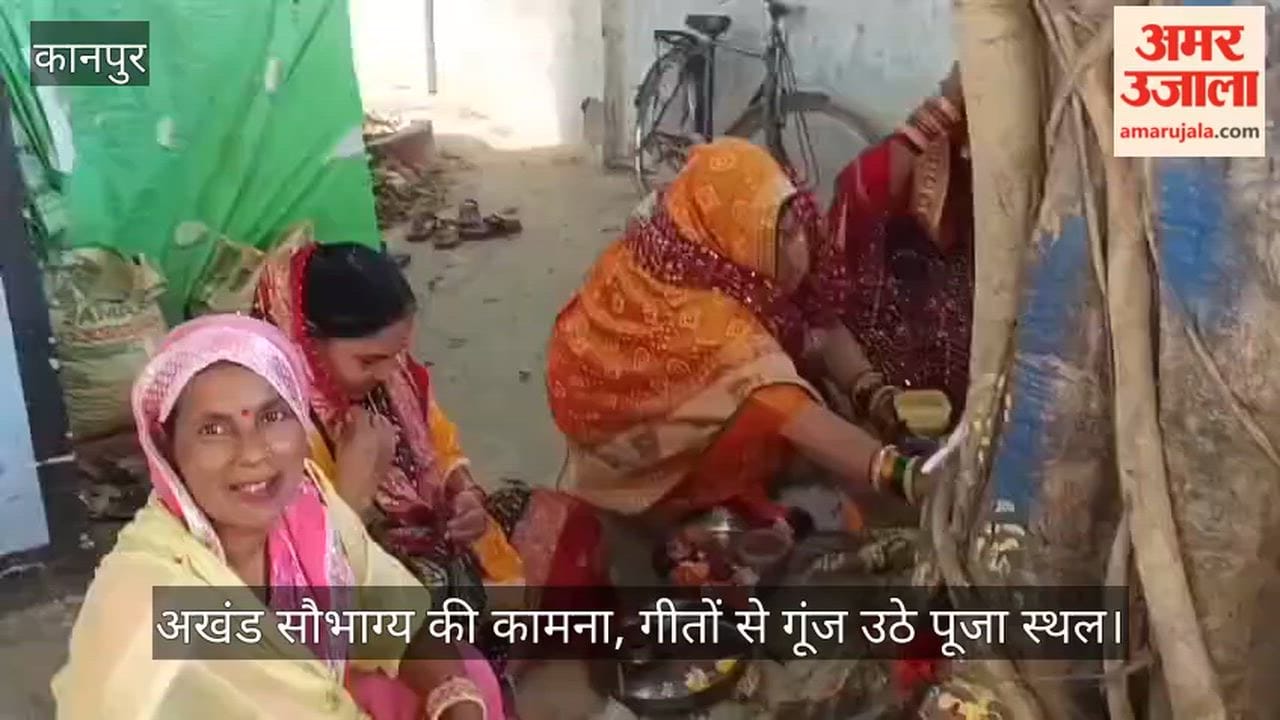 Kanpur May my beloved  life be as long as yours decked in Solah Shringar married women worship Banyan tree