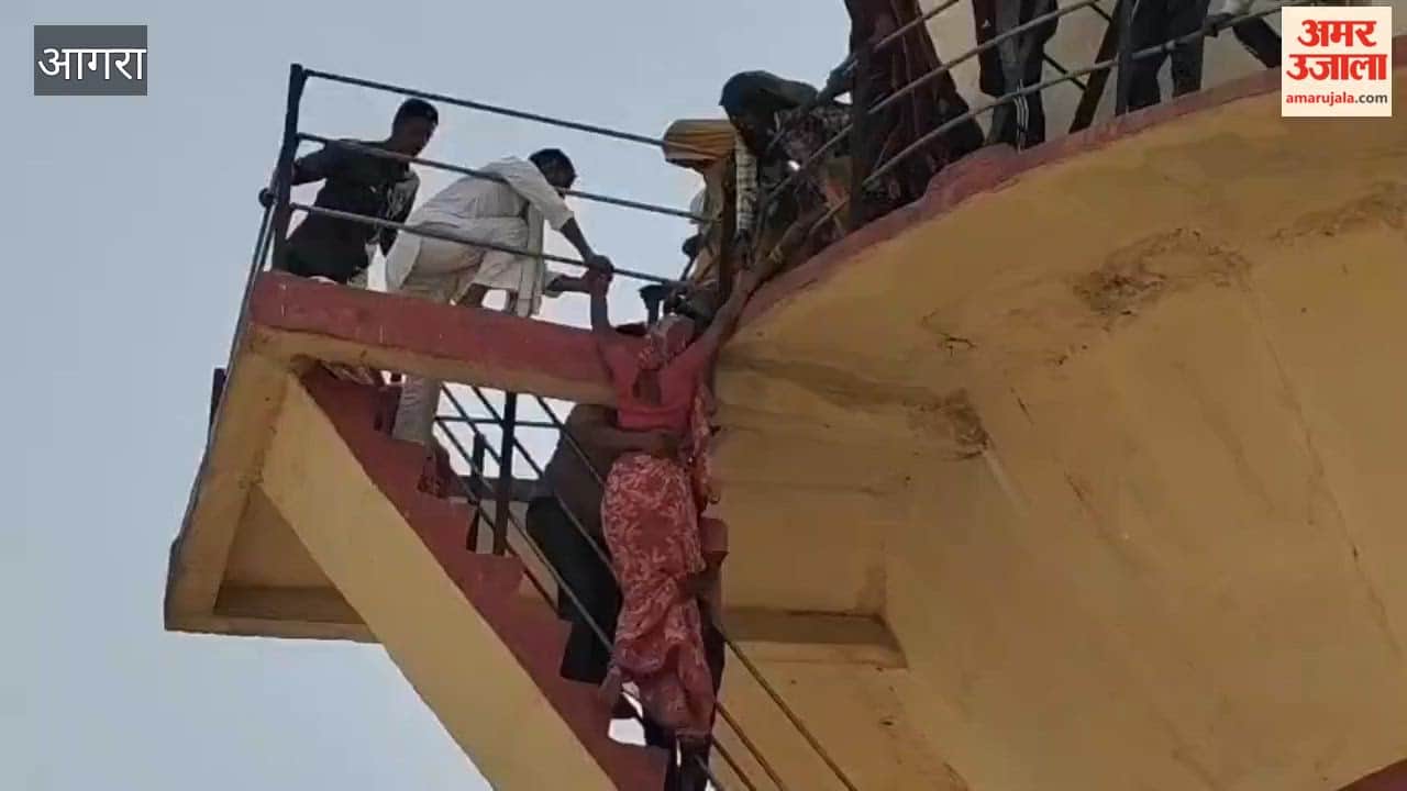 Villagers climb water tank over water crisis woman attempts to jump
