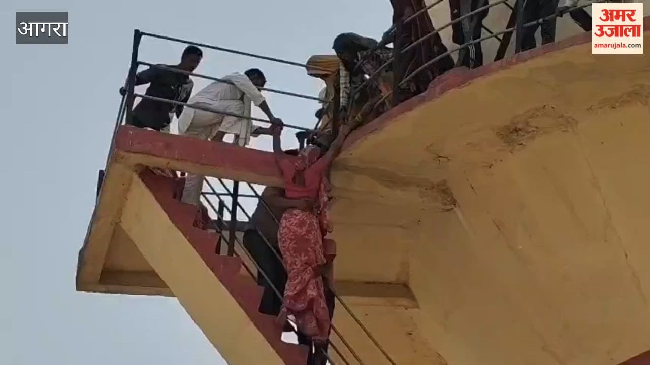 Villagers climb water tank over water crisis woman attempts to jump