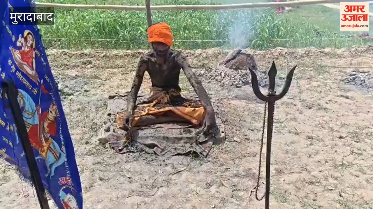 The Mahant sits in penance amidst burning cow-dung cakes, praying for rain