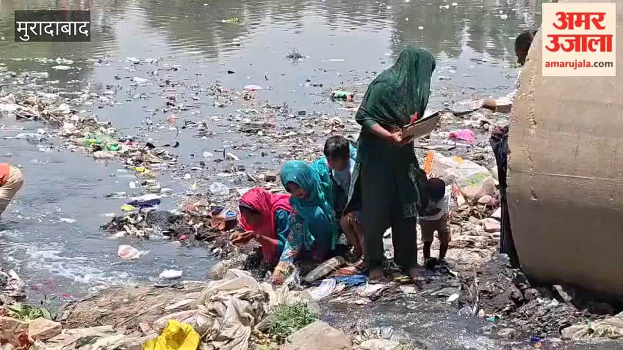 Devotees, along with children, took a holy dip