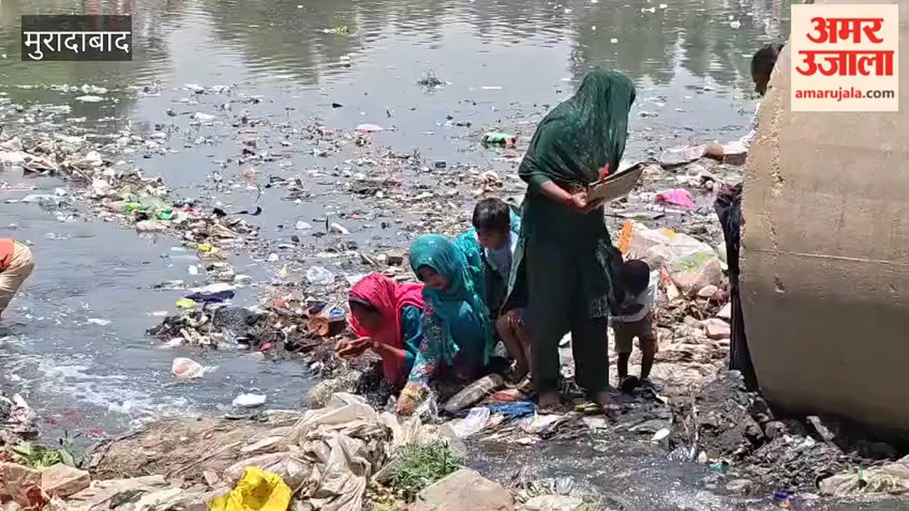 Devotees, along with children, took a holy dip