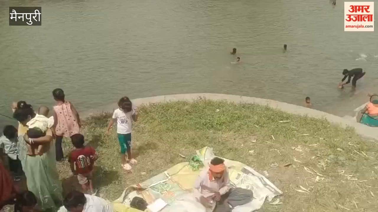 Devotees Take Holy Dip in Canal on Jyeshtha Dussehra