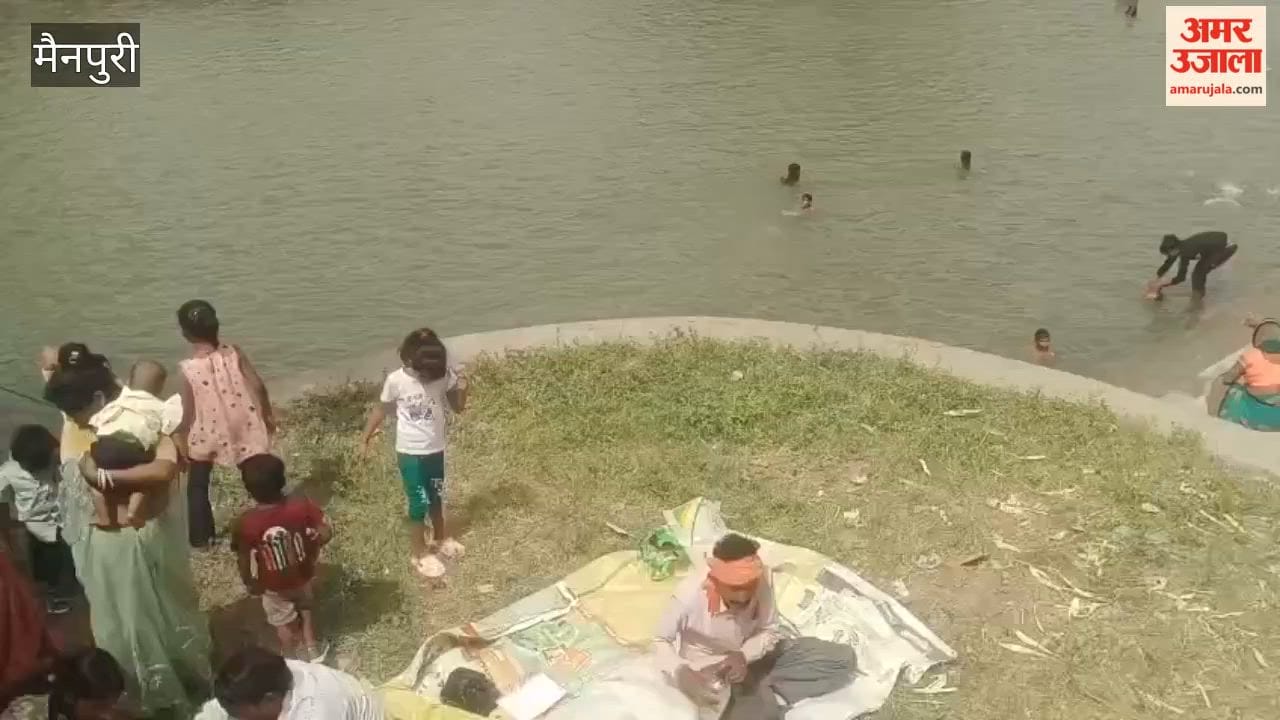 Devotees Take Holy Dip in Canal on Jyeshtha Dussehra