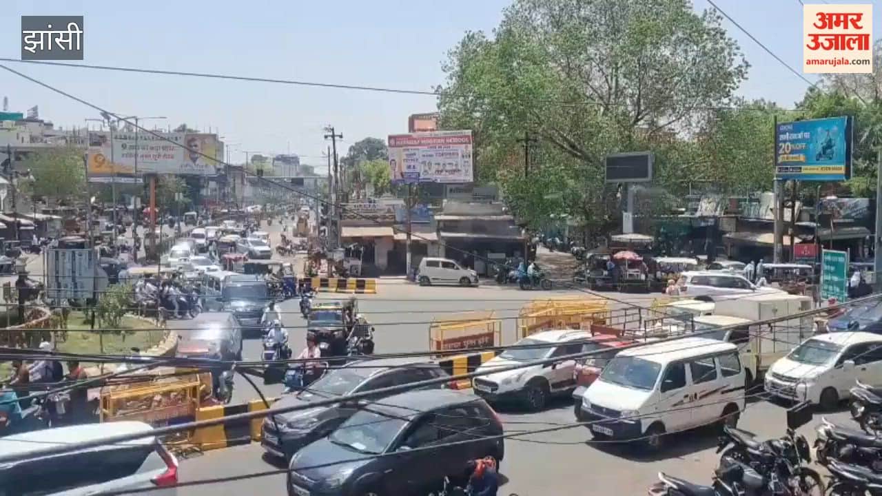 Water sprinklers are being used to provide relief to people from the scorching heat.