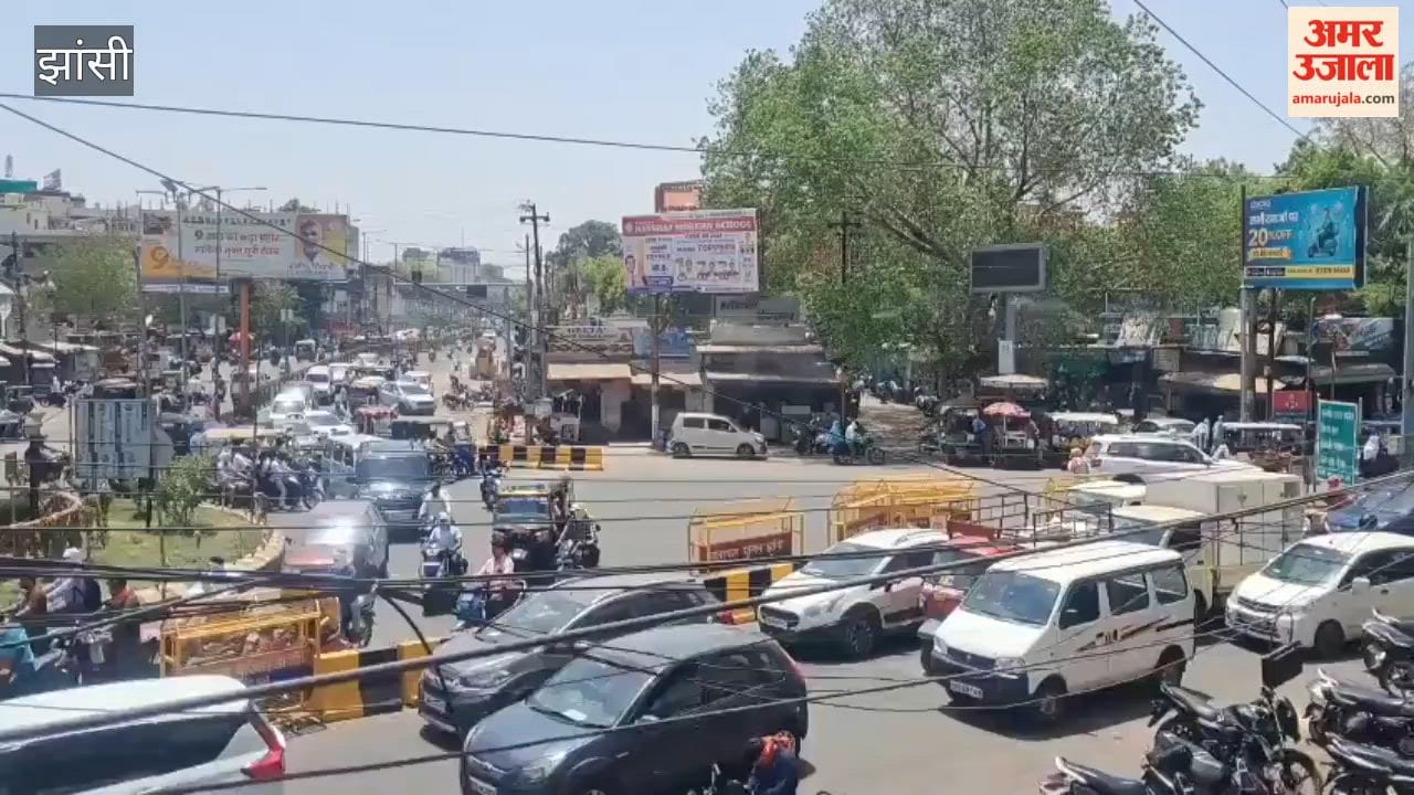 Water sprinklers are being used to provide relief to people from the scorching heat.