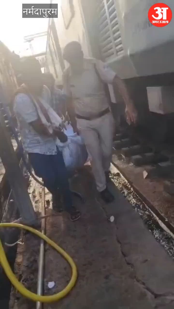 A woman carrying a child in her lap was boarding a moving train when she slipped and lost both her legs.