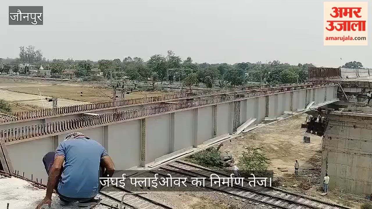 Girders hoisted onto the Janghai Flyover using a crane in jaunpur