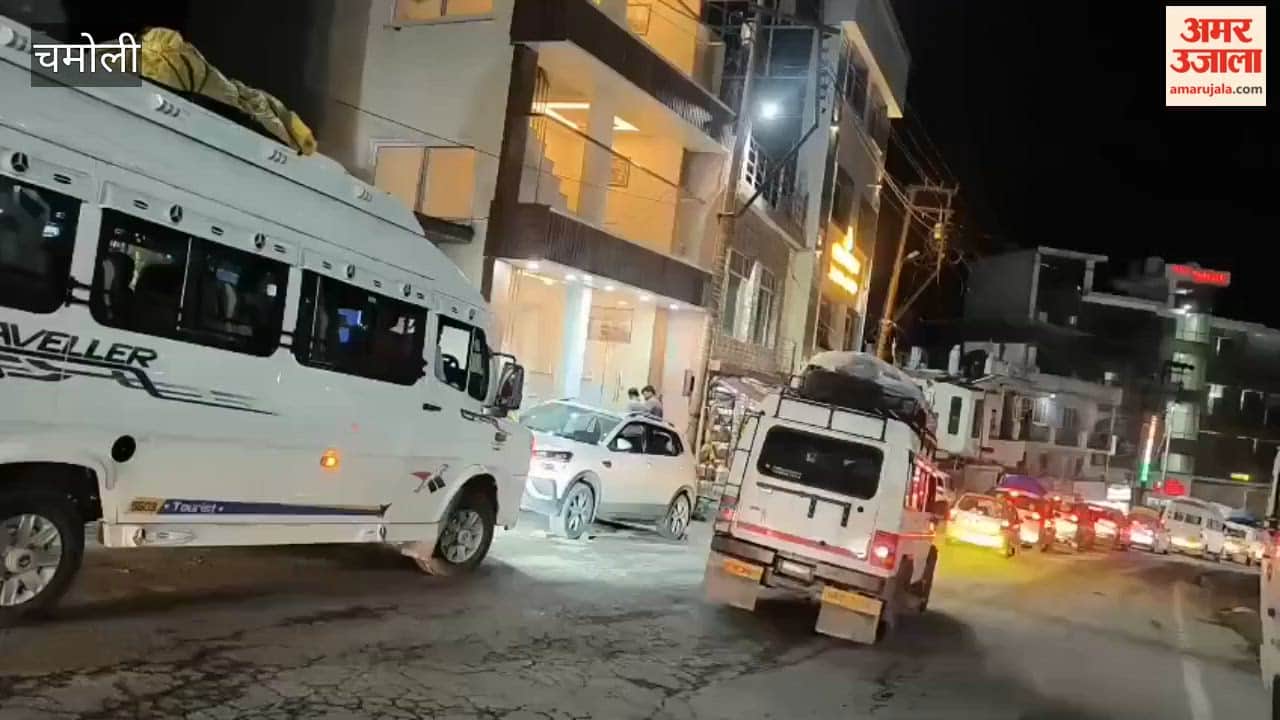 Passenger vehicles halted at Pipalkoti following an accident on the Badrinath Highway