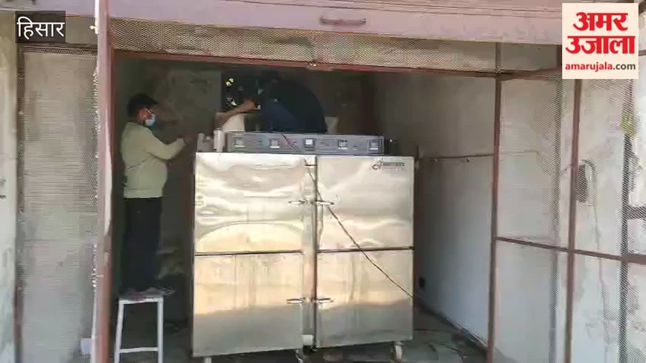A woman's body was found gnawed by rats in a mortuary; engineers arrived to inspect the freezer