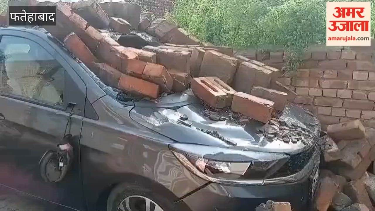 Wall collapses during strong winds and rain in Tohana, Fatehabad; Tata Tiago car crushed.