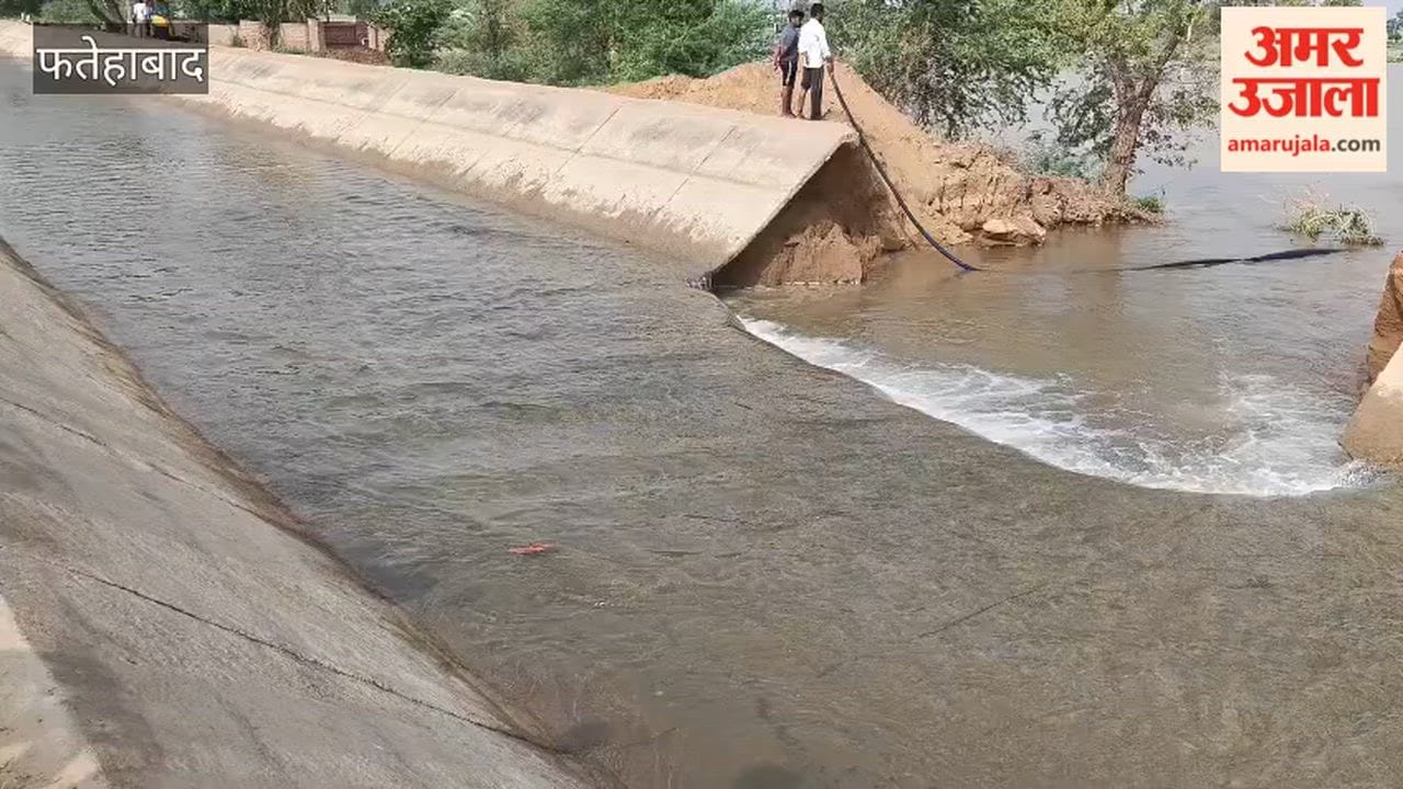 Sirsa Branch canal breaches at Bhodiakhera in Fatehabad; water floods several acres due to Irrigation Department's negligence.