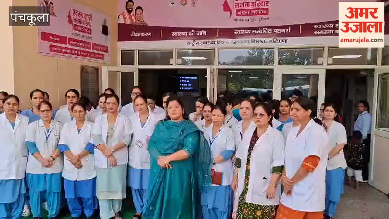 Nursing officers protest outside the Mother and Child Care building in Panchkula.