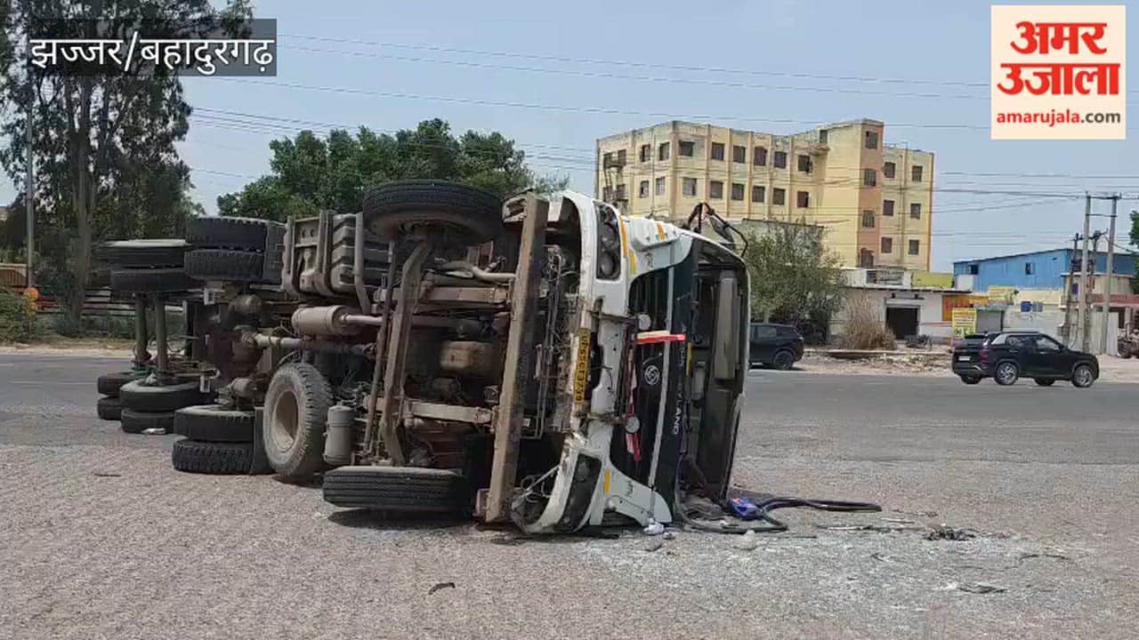 Trailer overturns while trying to avoid a bus; driver critically injured in bahadurgarh
