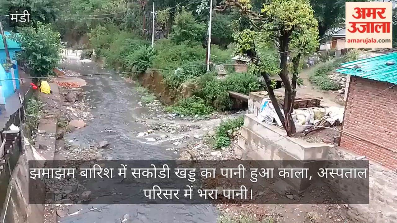 Water in Sakodi Khad turns black amidst heavy rain; hospital premises flooded.