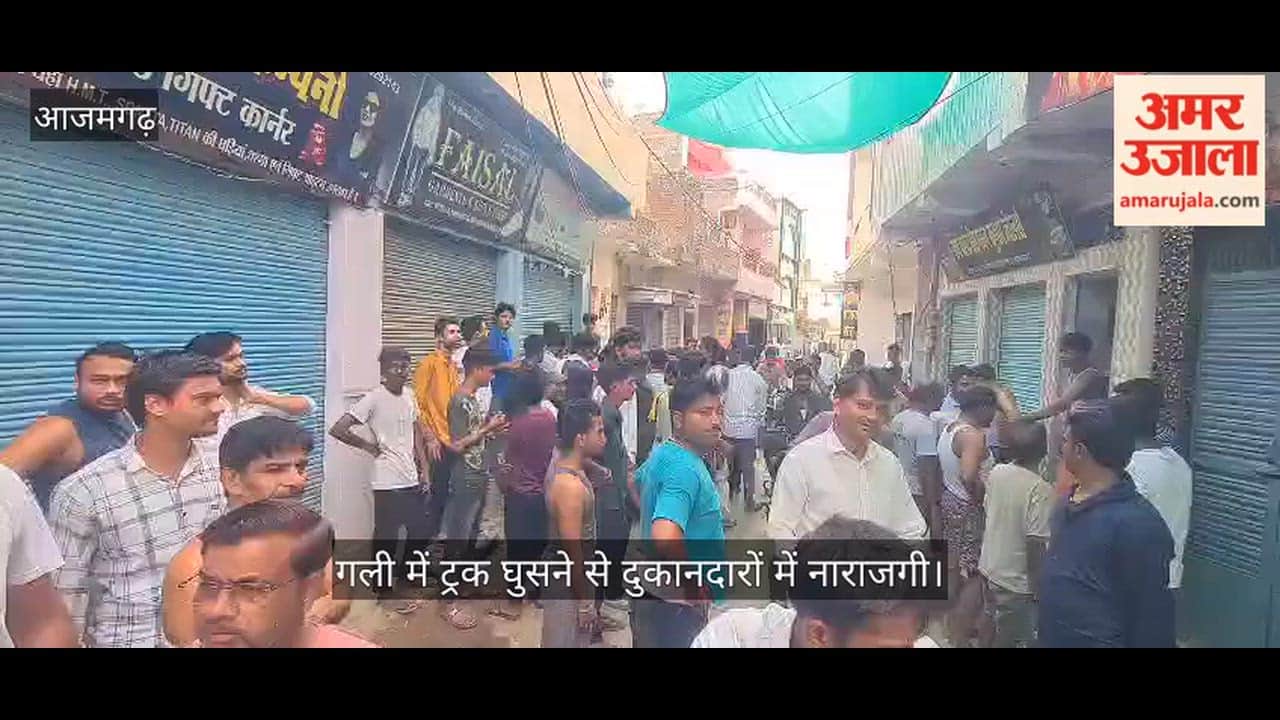 Trailer truck enters narrow lane relying on Google Maps several shops and house balconies damaged