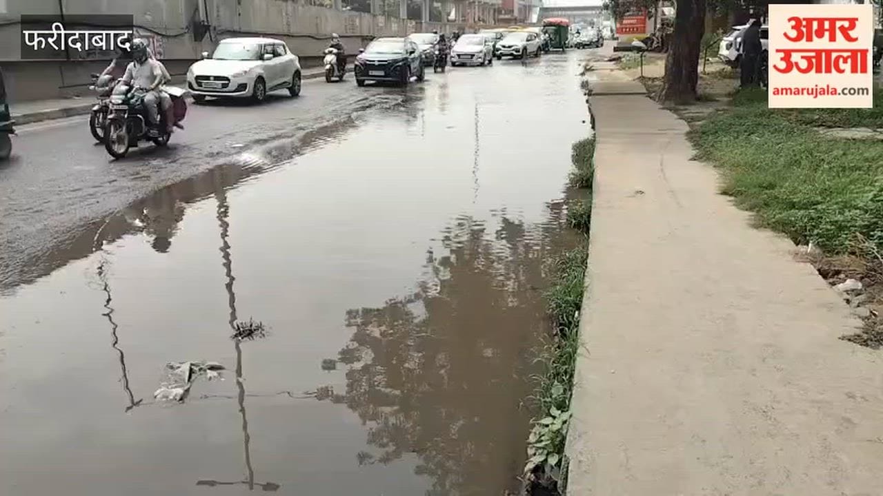 Faridabad Rainwater causes traffic jam on service road and motorists inconvenienced