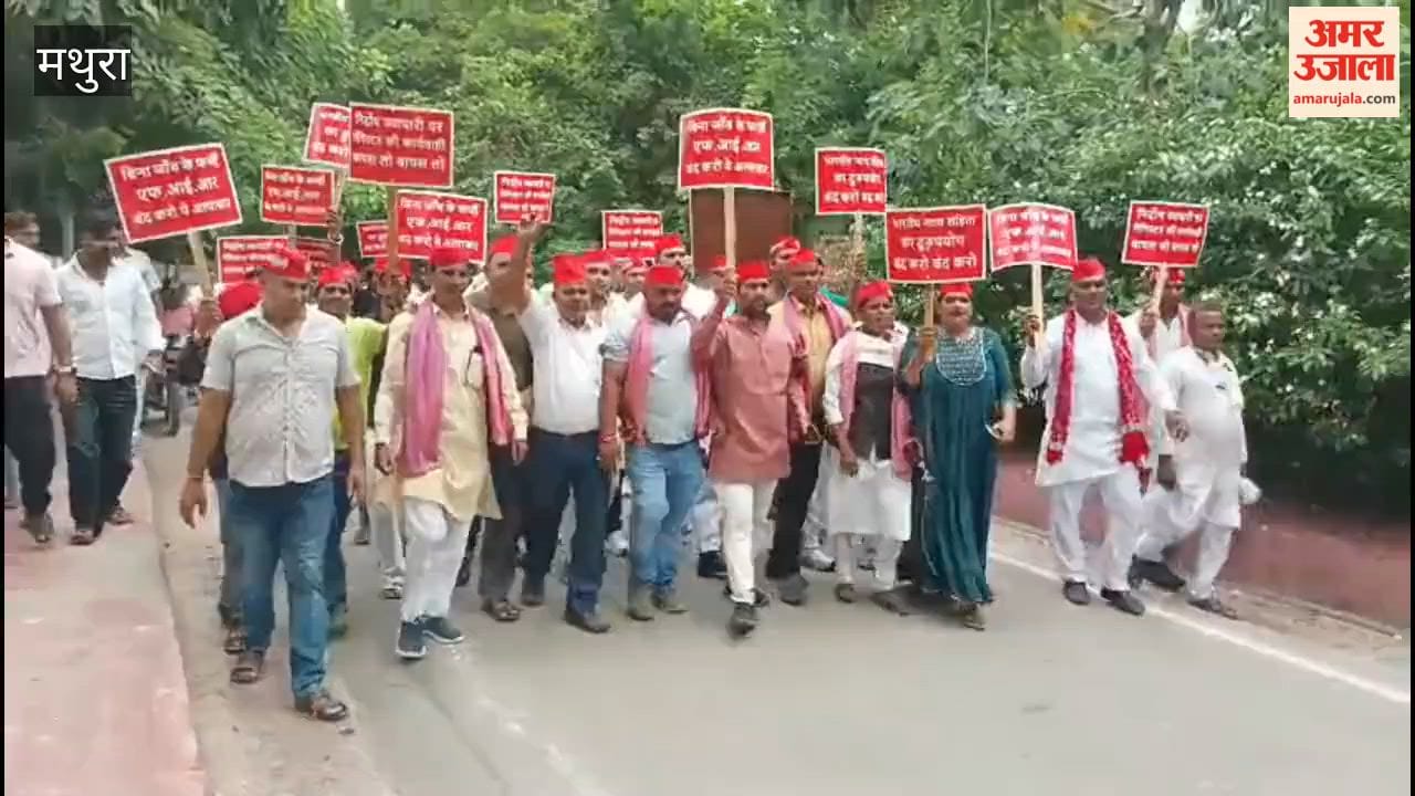 Allegation of a false case against an SP leader; party workers reach the Collectorate.