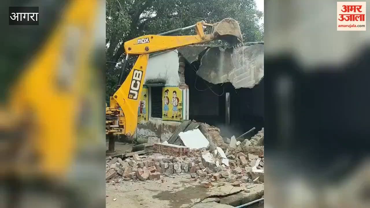 Bulldozer razes dilapidated school building; demand raised for a boundary wall.