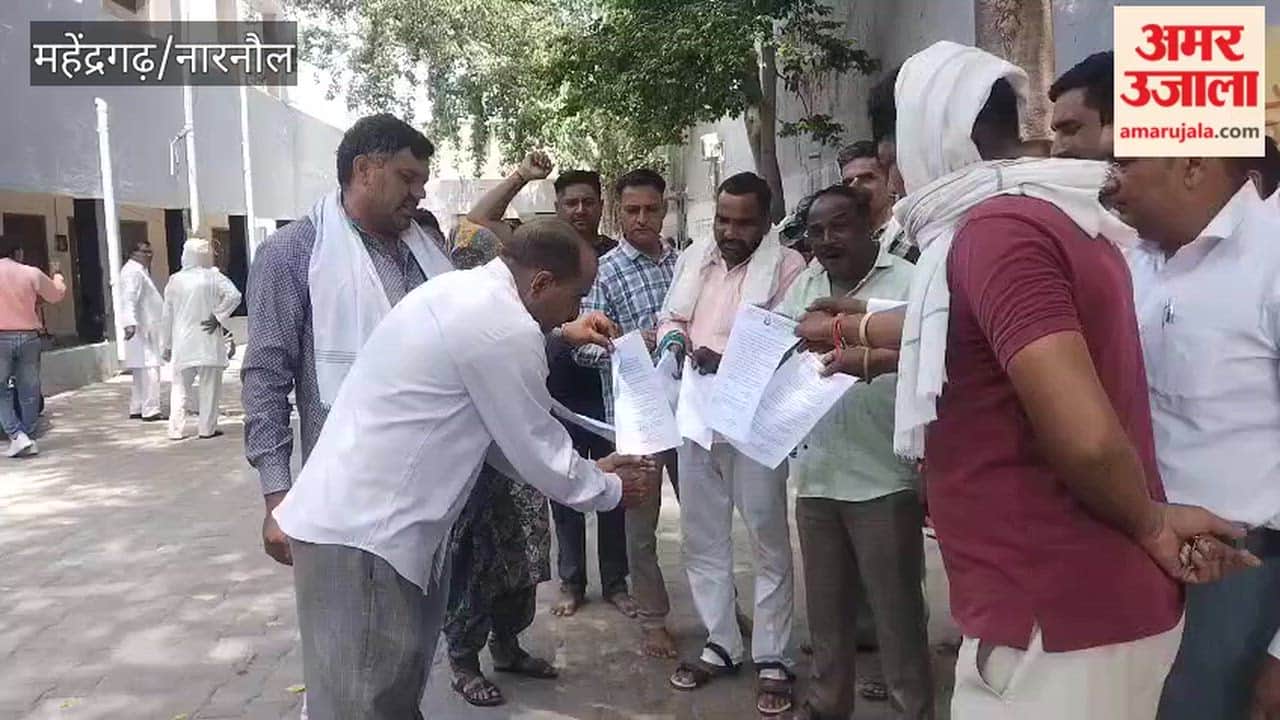 Sanitation and fire department employees in Mahendragarh protested by burning copies of government orders.