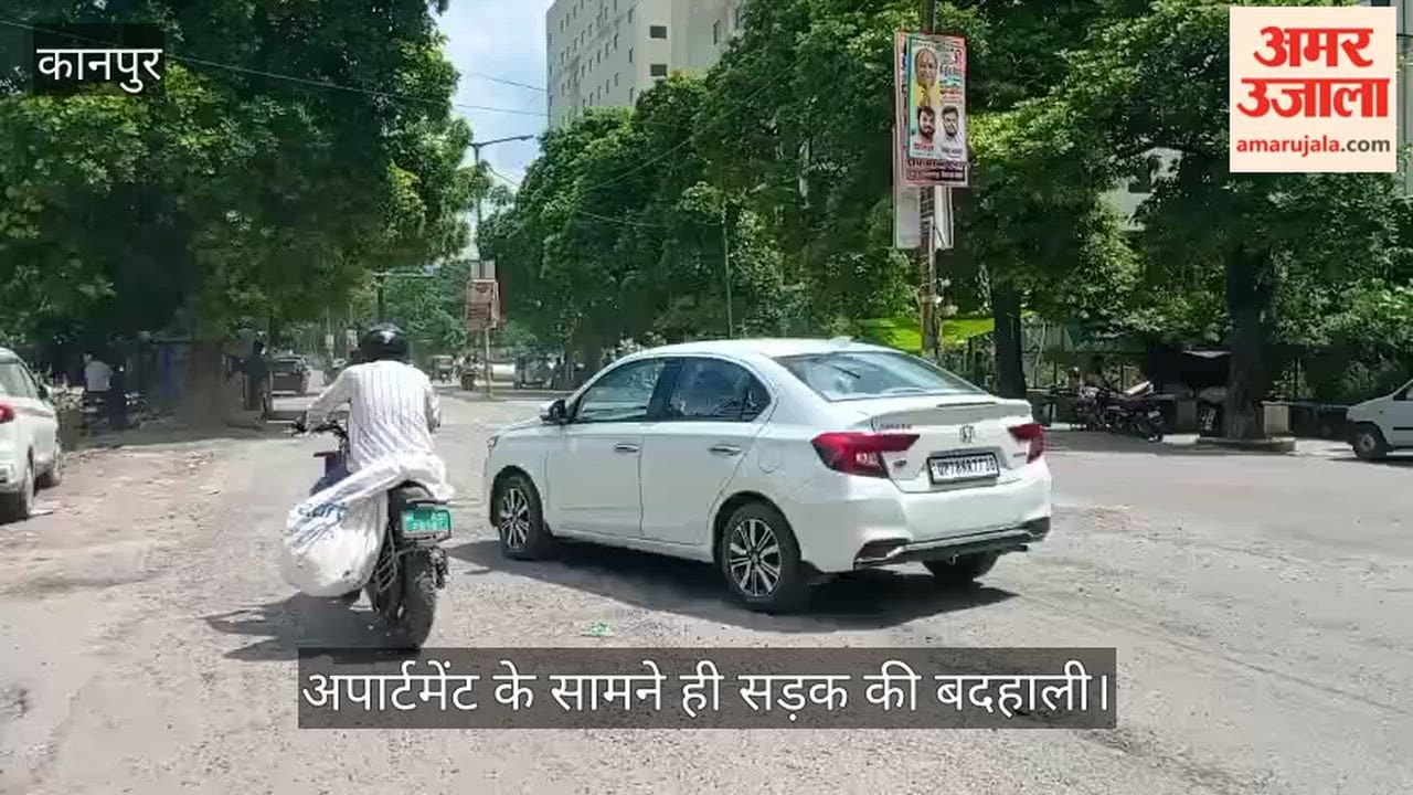 Road Turns Into Potholes in Front of Signature Greens Apartment on Vikas Nagar Road
