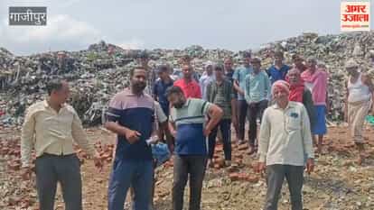 Garbage pile on main road for four years; villagers outraged over dumping of dead animals