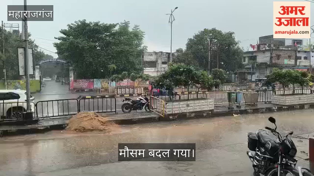 Weather turns pleasant due to sudden rain; passersby get relief from the heat.