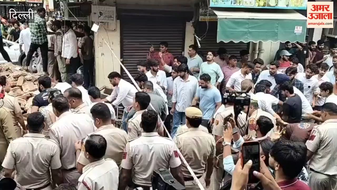 Local children are helping in removing debris by becoming human chain