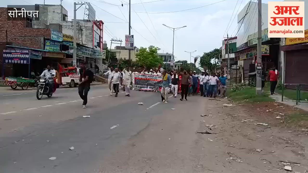 Sanitation workers in Sonipat took out a procession through the city, carrying brooms.