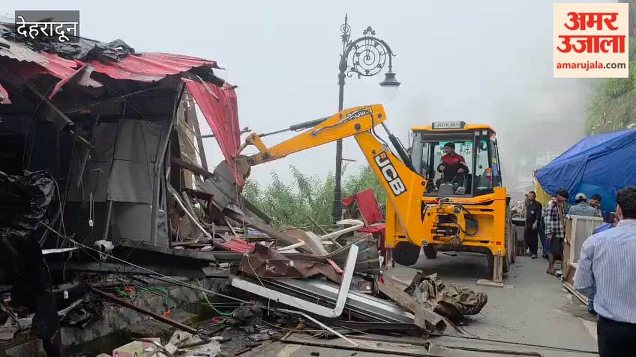 Mussoorie Bulldozer rolls onto Upper Mall Road illegal shops demolished