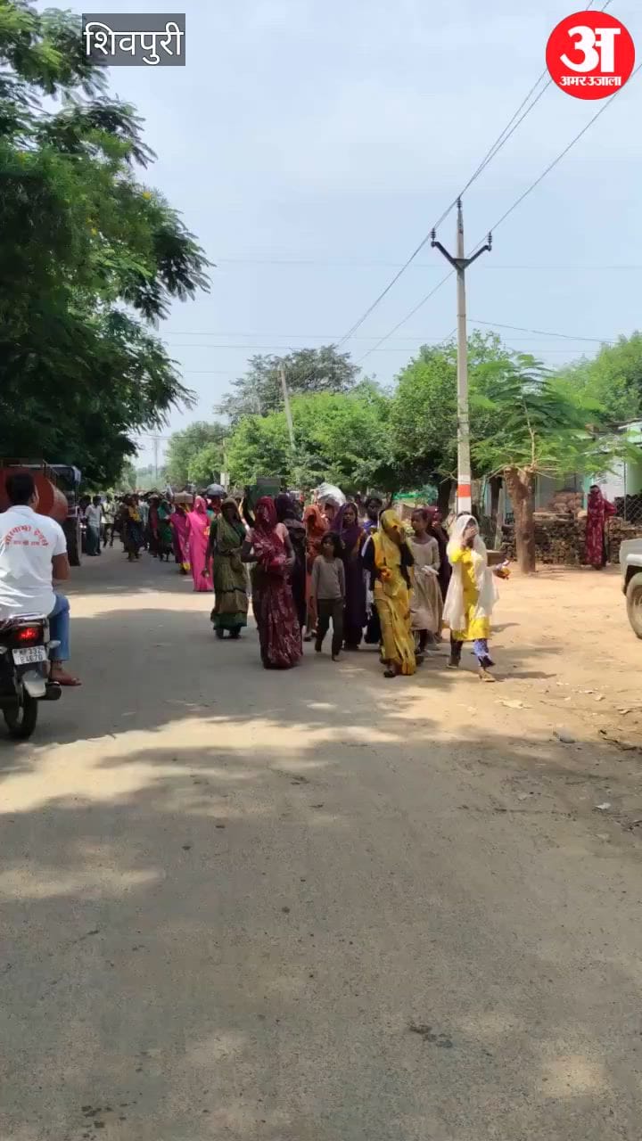 Women launch a protest against illicit liquor they arrived at the police station armed with sticks and liquor