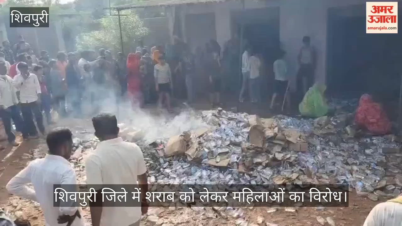 Women's anger erupts against liquor sales; they dragged crates onto the road and set the alcohol on fire.