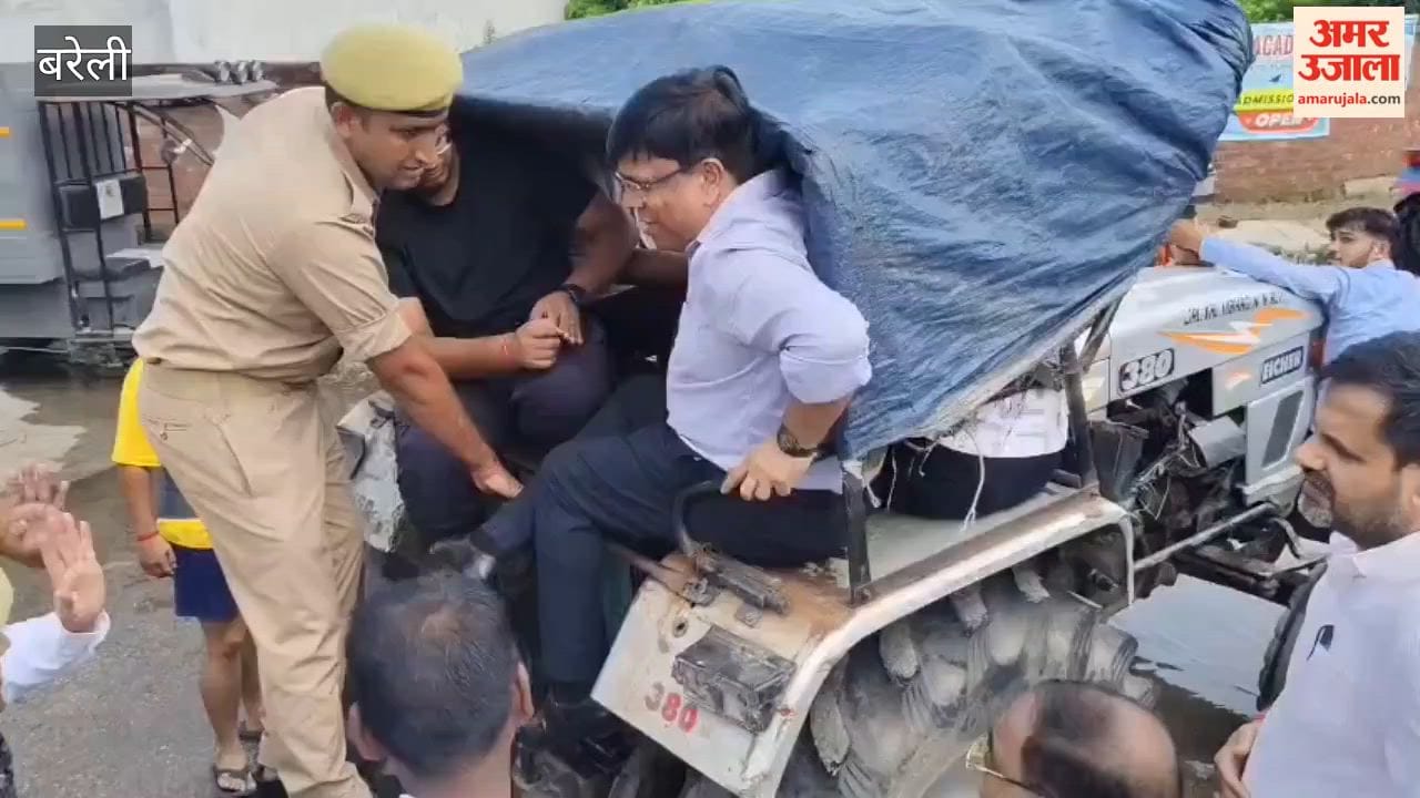 DM and Municipal Commissioner arrive at Residency Garden on a tractor